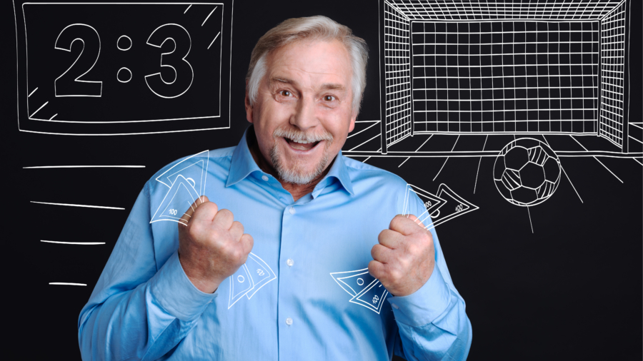 Joyful happy man holding banknotes